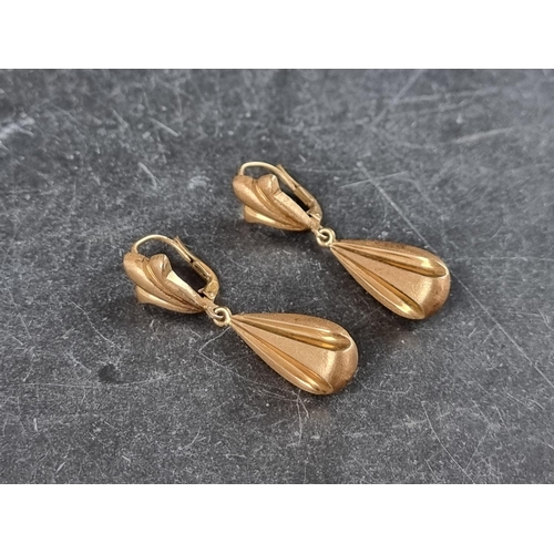 302 - A pair of pendant drop earrings, stamped '750', 45mm high.