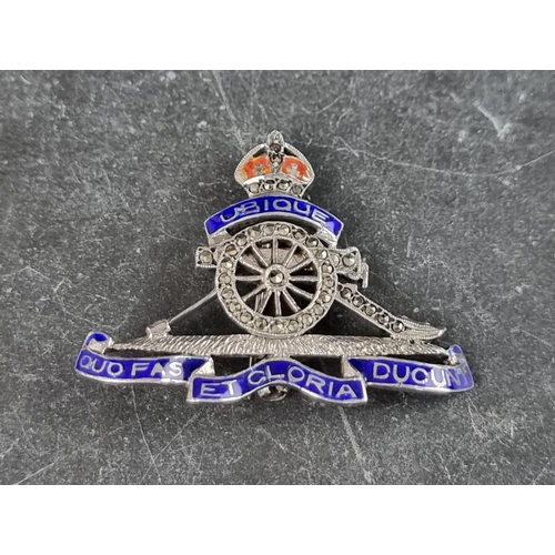 307 - A white metal, marcasite and enamel 'Royal Horse Artillery' sweetheart brooch, 41mm wide.... 