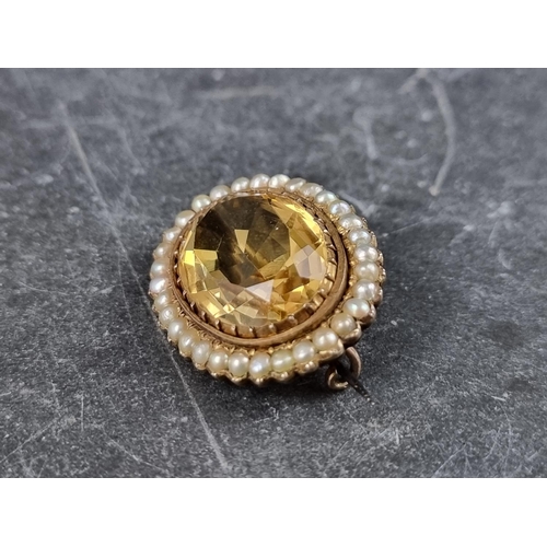 313 - A gold plated citrine and split pearl brooch, 28mm wide, with steel pin.