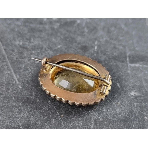 313 - A gold plated citrine and split pearl brooch, 28mm wide, with steel pin.