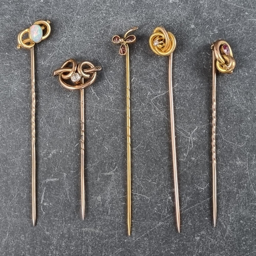 317 - Five gem set stick pins.