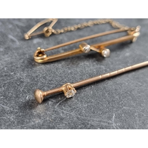 321 - A yellow metal stick pin, set old cut diamond, 61mm high; together with a yellow metal bar brooch, s... 