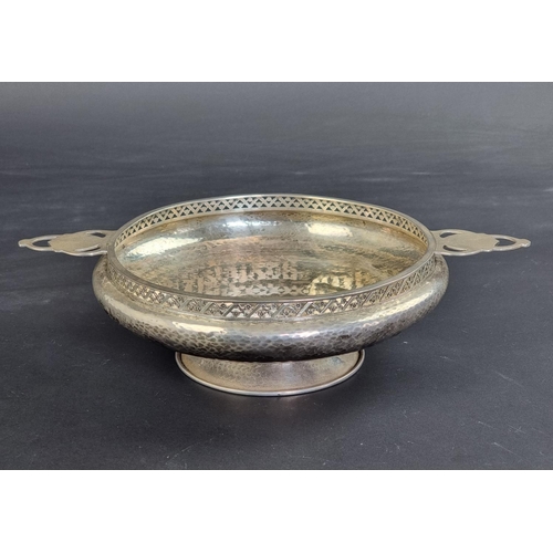 34 - A hammered silver quaich style bowl, by Albert Edward Jones, Birmingham 1945, 28cm wide, 331g.... 