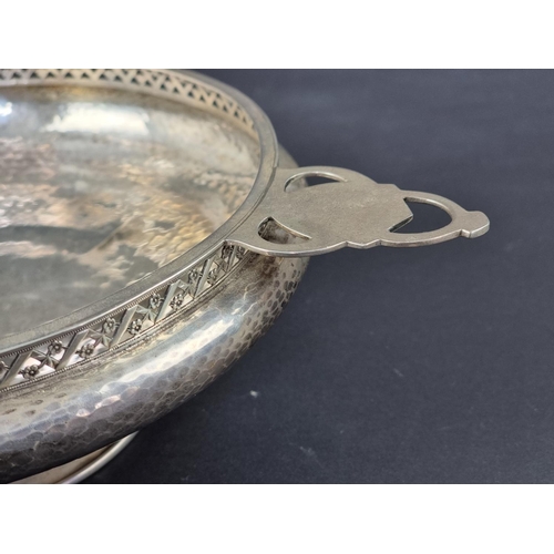 34 - A hammered silver quaich style bowl, by Albert Edward Jones, Birmingham 1945, 28cm wide, 331g.... 