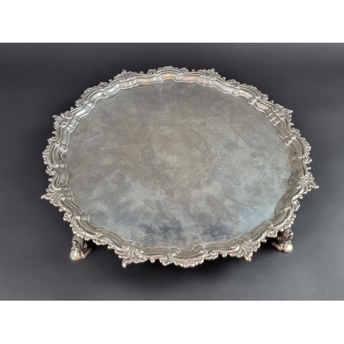 38 - A large white metal piecrust salver, unmarked, 43.5cm diameter.