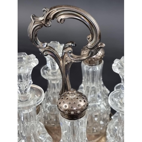 39 - A Victorian silver mounted cruet stand, by Henry Wilkinson & Co, Sheffield 1845, 28cm high.... 