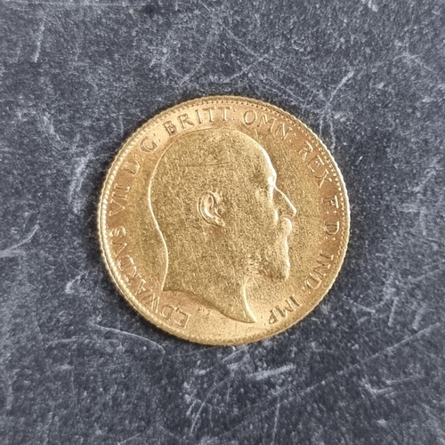 421 - Coins: an Edward VII 1907 gold half sovereign.