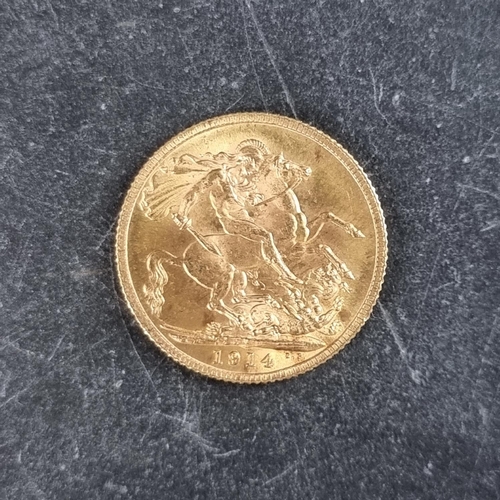 424 - Coins: a George V 1914 gold sovereign.