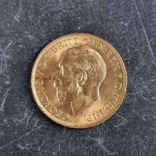 424 - Coins: a George V 1914 gold sovereign.