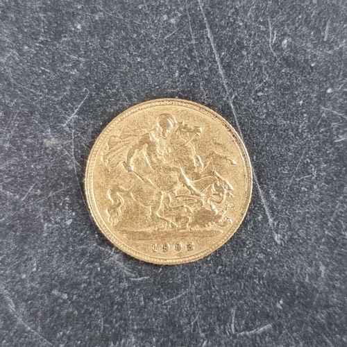 425 - Coins: an Edward VII 1903 gold half sovereign.