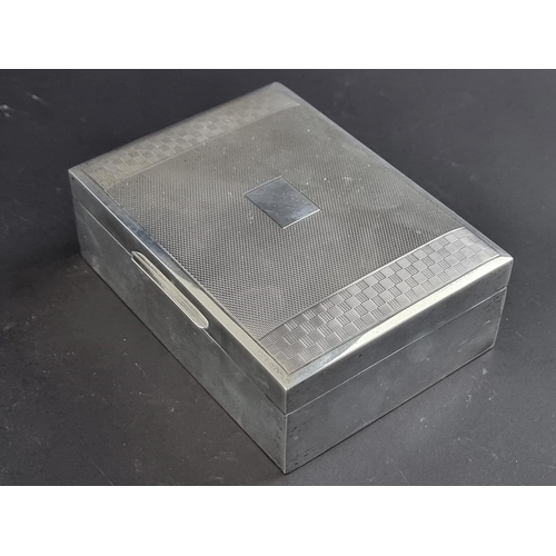 43 - A silver cigarette box, by Viner's Ltd, Sheffield 1961, 12cm wide.