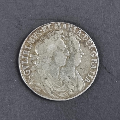 434 - Coins: A William and Mary 1689 silver half crown.