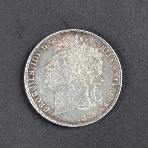 435 - Coins: a George IV 1824 silver half crown.