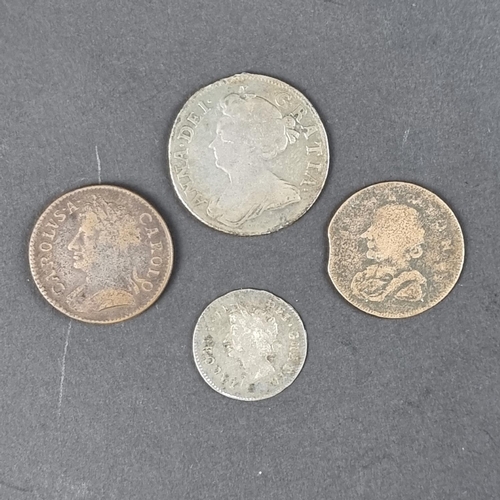 437 - Coins: a Queen Anne 1708 silver shilling; together with a James II 1687 silver threepence; a Charles... 