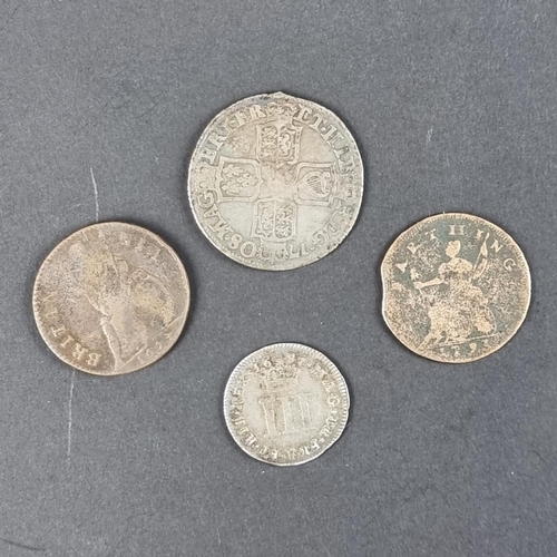 437 - Coins: a Queen Anne 1708 silver shilling; together with a James II 1687 silver threepence; a Charles... 