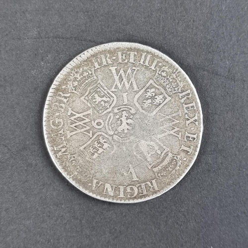 440 - Coins: a William & Mary 1691 silver half crown.