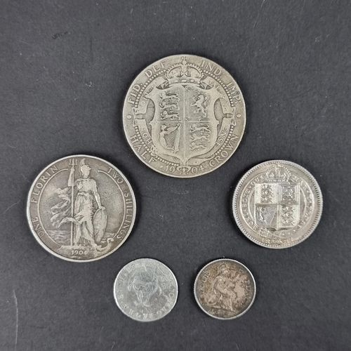 442 - Coins: a Victoria 1887 silver shilling, EF; together with a Charles II 1670 silver threepence and th... 