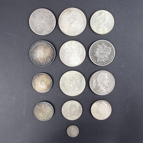 446 - Coins: a quantity of world coins, to include three US silver dollars 1879, 1921 and 1922.... 