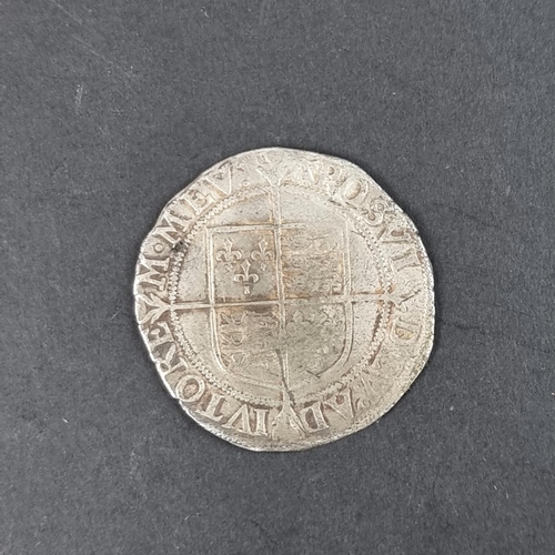 447 - Coins: an Elizabeth I silver shilling, sixth issue 1582-1600, 5.9g, without rose or date.... 