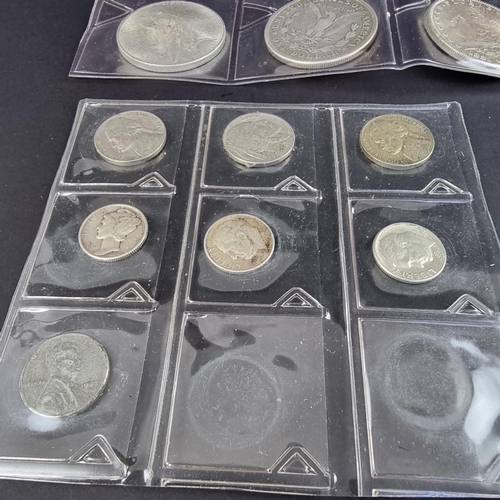 452 - Coins: three US silver dollars; 1881 mintmark S, 1921 and 1923; together with thirteen other US coin... 