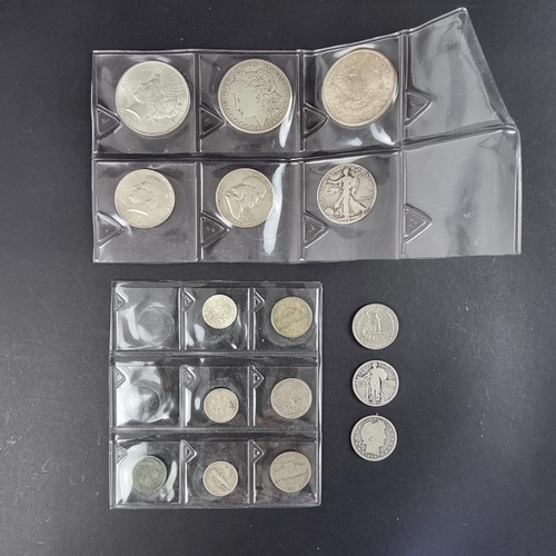 452 - Coins: three US silver dollars; 1881 mintmark S, 1921 and 1923; together with thirteen other US coin... 