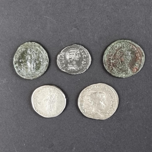 461 - Coins: five Roman coins, to include a Trajan AD 97-117 AR denarius; and a Julia Mamaea AR denarius.... 