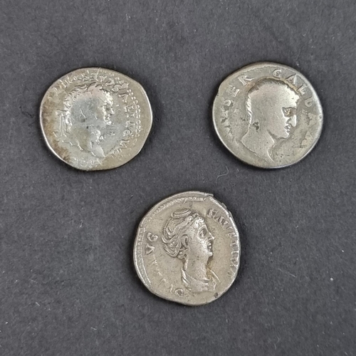 462 - Coins: three Roman coins; comprising a Galba AD 68-69 AR denarius; a Titus AD 79-81 AR denarius; and... 