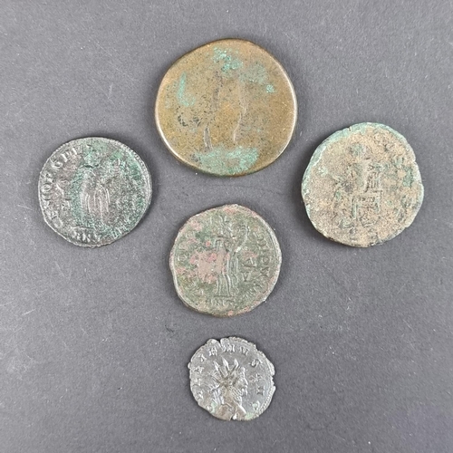 465 - Coins: five Roman coins; to include a Trajan AD 98-117 AD sestertious; and a Diocletian AD 284-305 A... 