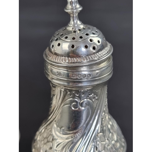 49 - A pair of Victorian silver pepperettes, by J B, London 1883, 11.5cm high, 157g.