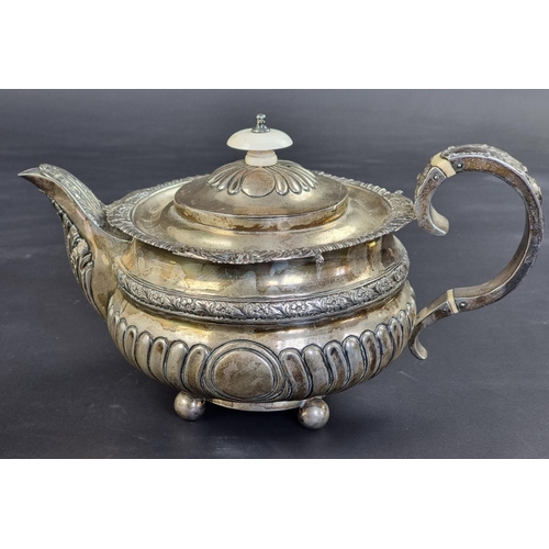 5 - A George III silver teapot, by Thomas Wallis (II) & Jonathan Hayne, London 1816, having ivory in... 