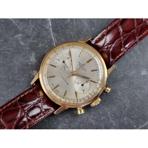 500 - A 1960s Breitling 'Top Time' chronograph gold plated manual wind wristwatch, 36mm, Ref. 2000, on lat... 