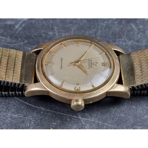 513A - A 1950 Omega 'Seamaster' gold plated automatic wristwatch, 34mm, Ref. 2577-13 SC, Cal. 351, on later... 