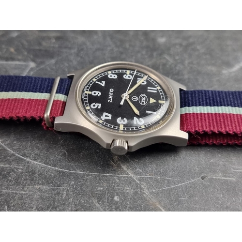 515 - A 1990s military issue CWC 'G10' stainless steel quartz wristwatch, 36mm, having 'Tritium Dial', the... 