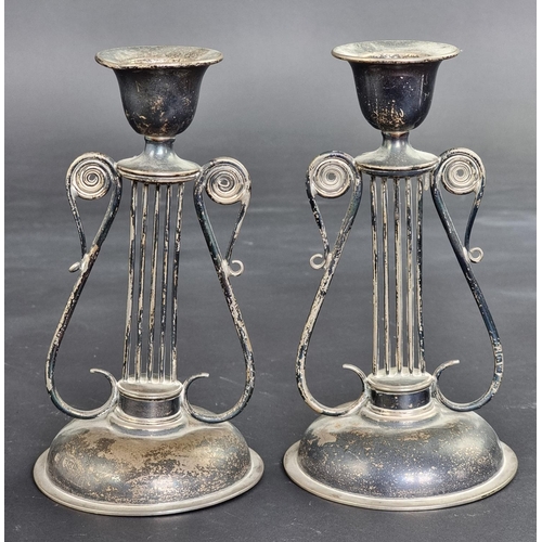 53 - A pair of Victorian silver lyre candlesticks, by Hukin & Heath, London 1897, 16cm high, 290g.... 