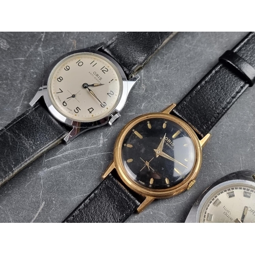 535 - A 1970s Oris 'Twin Date' stainless steel manual wind wristwatch, 35mm; together with two 1960s Oris ... 