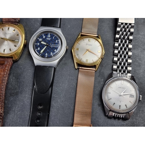 536 - A group of wristwatches, to include examples by Oris, Seiko and Swatch. (16)