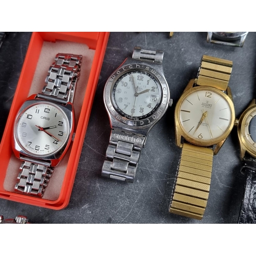 536 - A group of wristwatches, to include examples by Oris, Seiko and Swatch. (16)