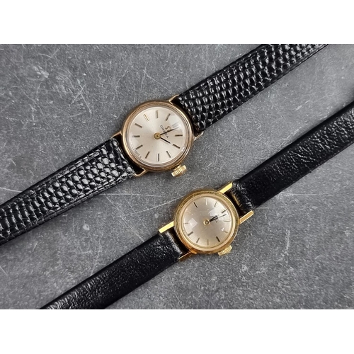 548 - A vintage Omega 18ct gold manual wind ladies wristwatch; together with a similar 9ct gold example, w... 