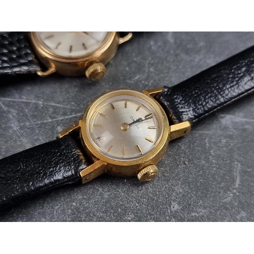 548 - A vintage Omega 18ct gold manual wind ladies wristwatch; together with a similar 9ct gold example, w... 