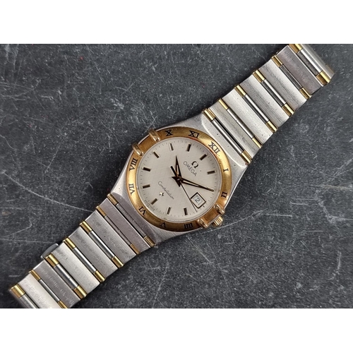 548A - A circa 2000 Omega 'Constellation' yellow metal and stainless steel quartz ladies wristwatch, 28mm, ... 