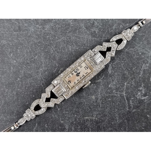 550 - A late 1920s platinum and diamond encrusted manual wind cocktail watch, 10mm x 23mm, on expanding br... 