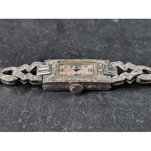 550 - A late 1920s platinum and diamond encrusted manual wind cocktail watch, 10mm x 23mm, on expanding br... 