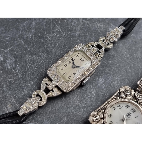 554 - A late 1920s sterling silver and paste set cocktail wristwatch, 14 x 21.5mm, on original rope strap;... 