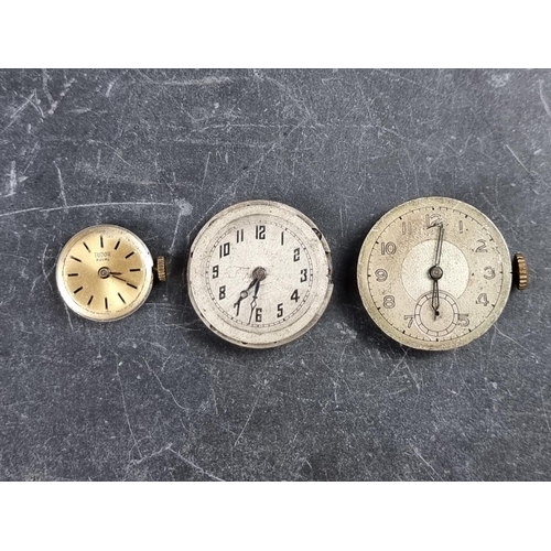 562 - A 1920s Rolex dial and manual wind movement; together with two further examples by Tudor and Rolco. ... 