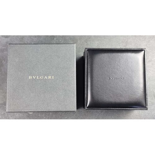 564 - A Bulgari black leather watch case and outer box, to include watch cushion and pouch.... 