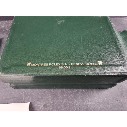 566 - A late 1990s Rolex wristwatch case, Ref. 68.00.2, (lacking cushion); together with a Rolex 'Oyster' ... 