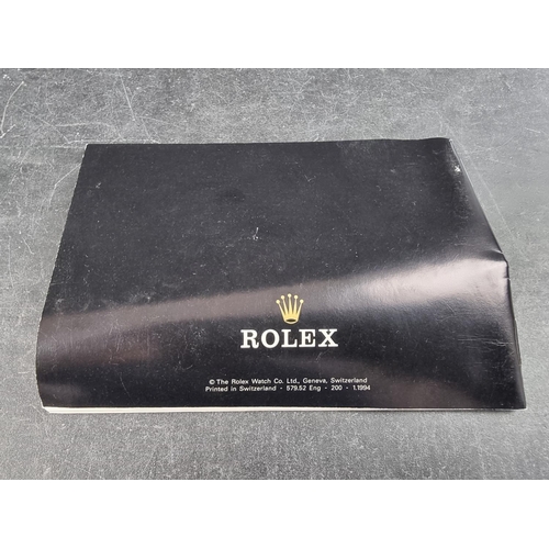 566 - A late 1990s Rolex wristwatch case, Ref. 68.00.2, (lacking cushion); together with a Rolex 'Oyster' ... 