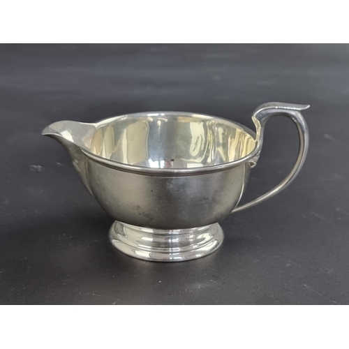 57 - A silver cream jug, by Deakin & Francis Ltd, Birmingham 1924, 7cm high, 114g.