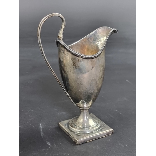 58 - A George III silver cream jug, probably by Charles Chesterman II, London 1790, 15cm high, 185g.... 