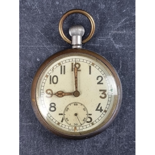 590 - A WWII military GSTP stem wind open face pocket watch, unsigned, engraved to back with broad arrow, ... 